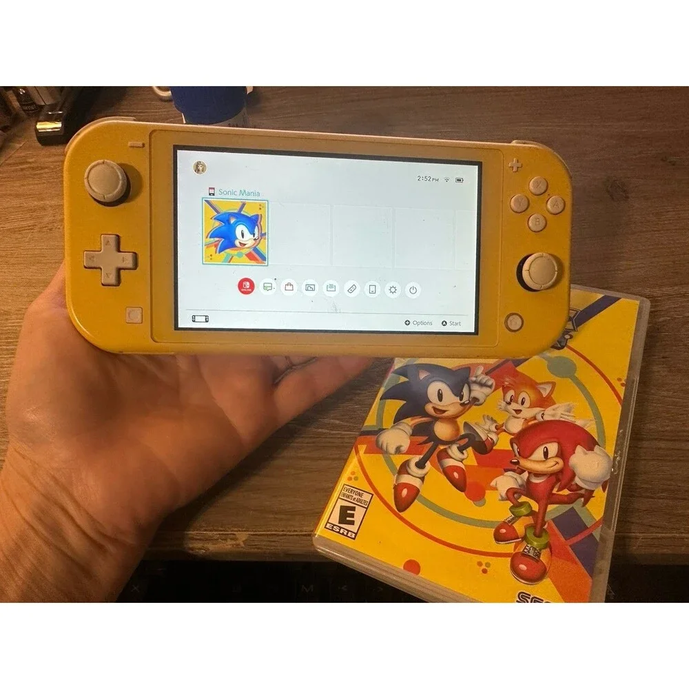 Nintendo Switch Lite Yellow Handheld Console Tested Works w/ microSD Card
